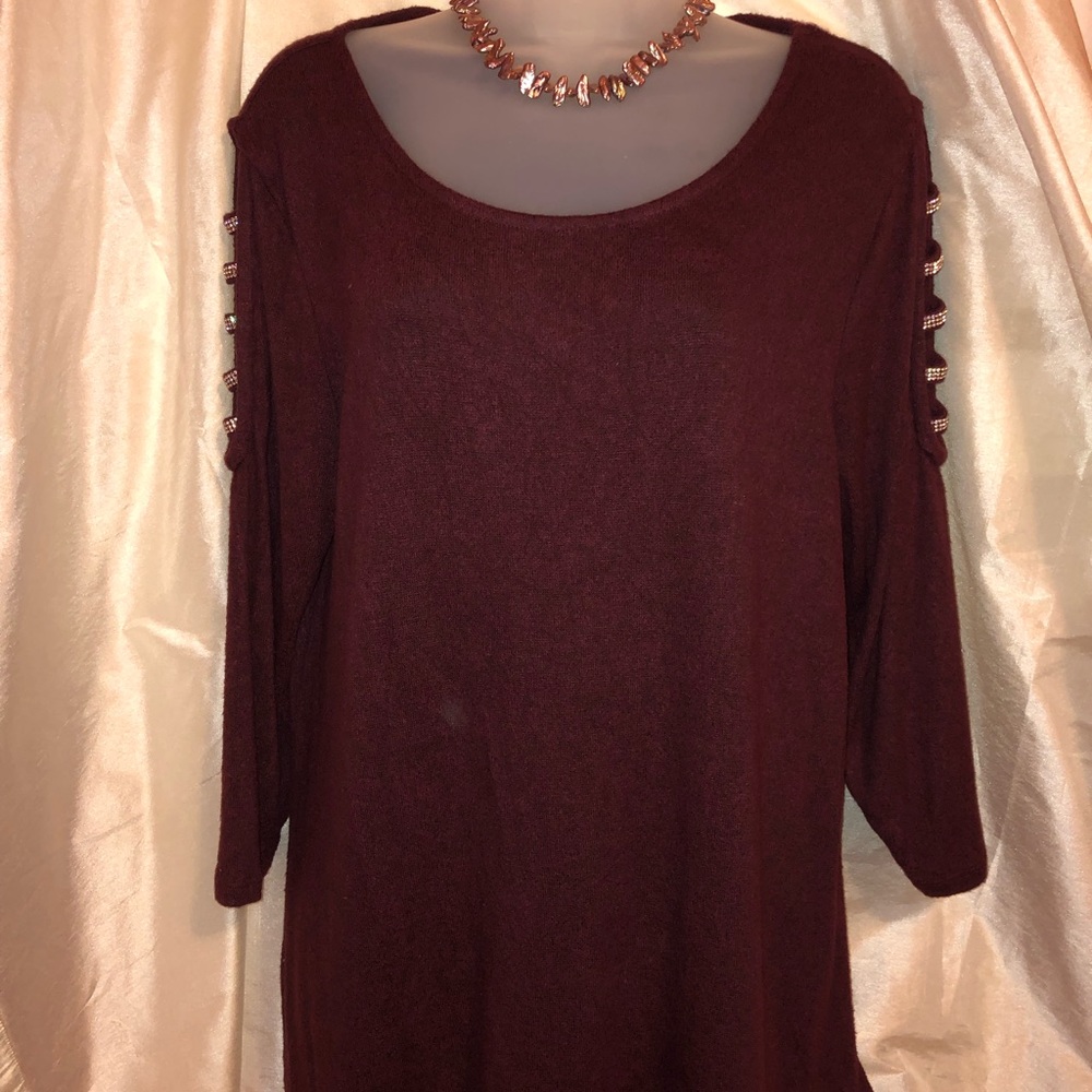 Sweater top with a Silver designs